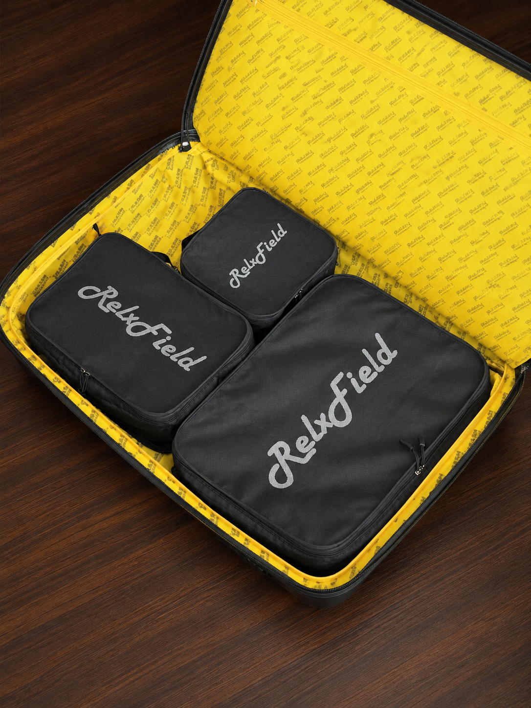 Reference travel organizer bag set packed in a suitcase